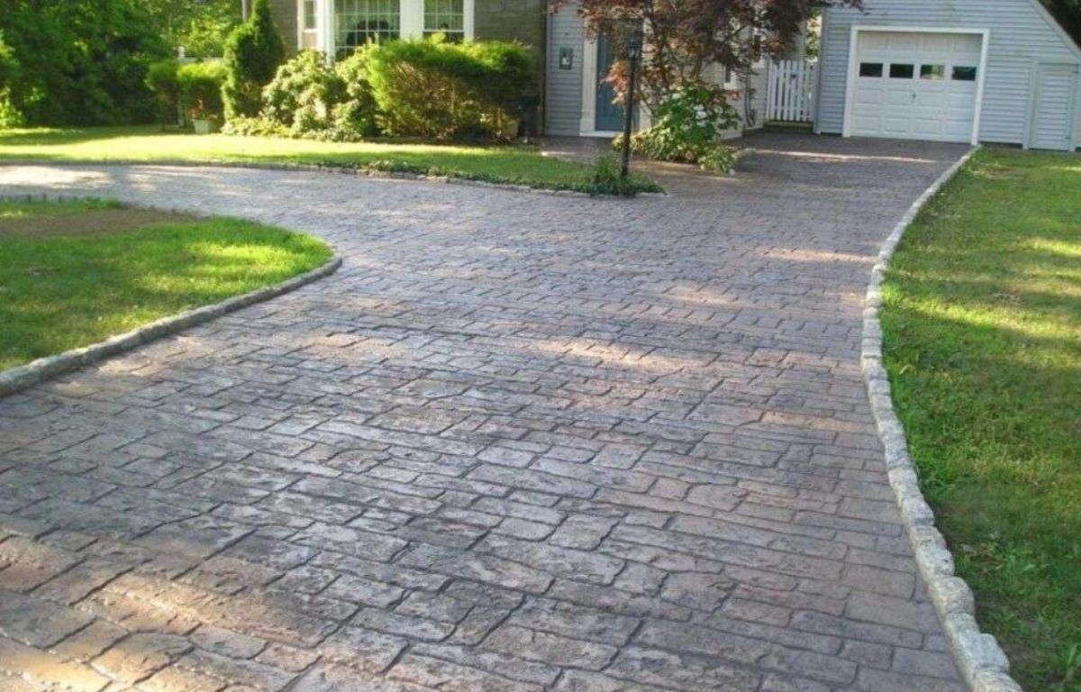 Stamped concrete driveway installation showing quality craftsmanship in Freeport, NY
